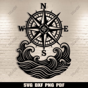 Peut inclure: Décoration murale en métal noir représentant une rose des vents au-dessus de vagues stylisées. La boussole indique le Nord, le Sud, l'Est et l'Ouest. Le texte "SVG DXF PNG PDF" est en bas.