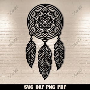 May include: Black, laser-cut dreamcatcher with a circular mandala design and three detailed feather pendants. The text "SVG DXF PNG PDF" is at the bottom. This decorative piece is suitable for wall art or craft projects.