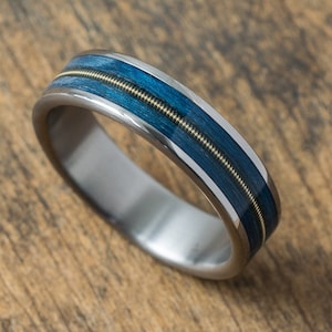 Titanium and blue ash ring with guitar string, anniversary gift, wedding band, promise ring, guitarist gift, musician ring, rockman band