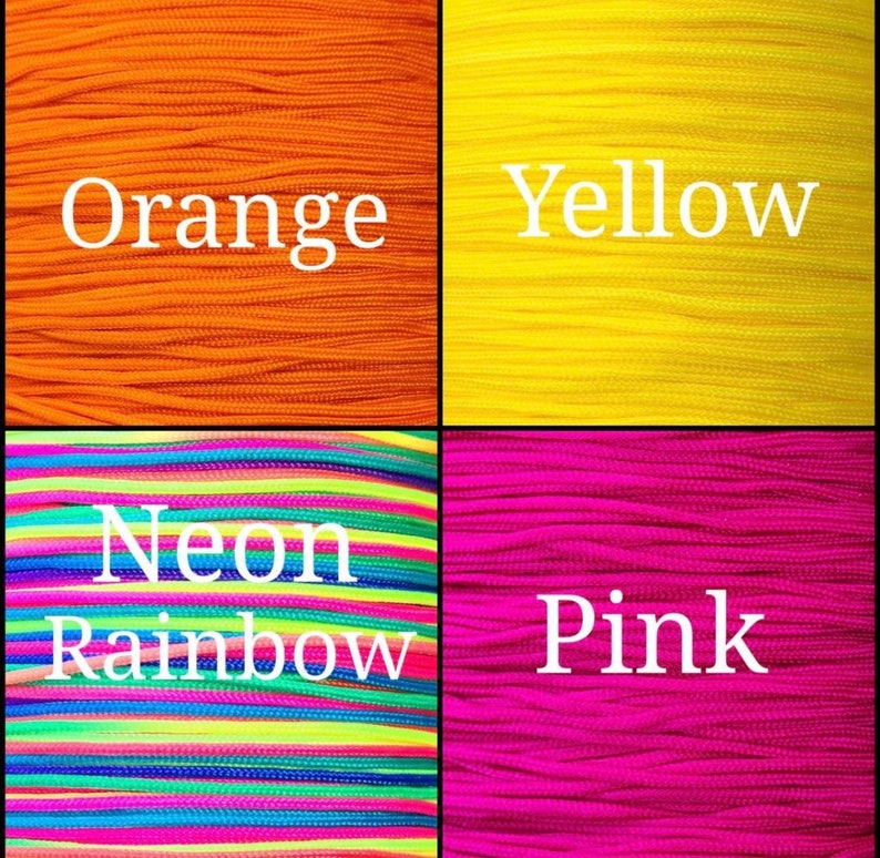 May include: Four spools of colorful paracord in orange, yellow, neon rainbow, and pink. The spools are labeled with the colors.