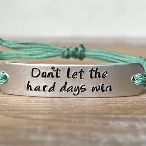 Don’t Let The Hard Days Win | Hand Stamped Adjustable Bracelet | Nylon Cord Bracelet | Aluminum Bar Bracelet | Choose Your Color Band