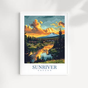 May include: A framed art print featuring a landscape scene of Sunriver, Oregon. The artwork depicts a river reflecting the sunset's orange and yellow hues, with a snow-capped mountain in the background. The text "SUNRIVER OREGON" is printed at the bottom.
