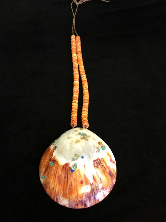 Orange shell pendent with orange bead necklace