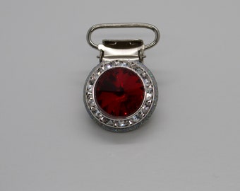 Irish Dance Competition Number Holder.  A coloured Rivoli Crystal, set on a round clip.