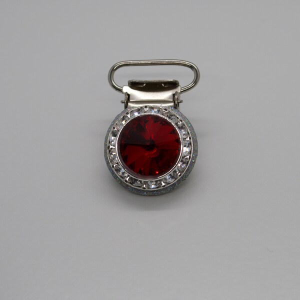 Irish Dance Competition Number Holder.  A coloured Rivoli Crystal, set on a round clip.