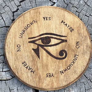 Egyptian eye of Horus pendulum board