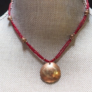 Copper Pendant with Bronze Inlay and Red Glass Beads and Round Copper Beads