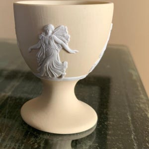 Wedgwood Jasperware Egg Cup/ Primrose Yellow with white dancing relief