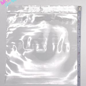 Sacos plásticos transparentes com furo para pendurar