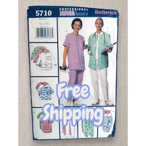 May include: Butterick 5710 sewing pattern envelope for professional uniform basics in size XL-XXL. The front displays illustrations of scrub tops, jackets, and pants in various colors and patterns, along with photos of two models wearing the garments.