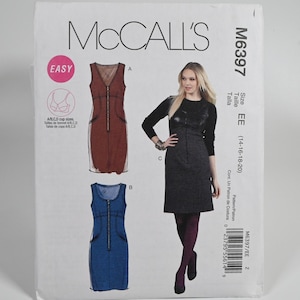 May include: McCall's M6397 sewing pattern envelope featuring illustrations of sleeveless dresses with front zippers in rust and blue. The package displays size EE (14-16-18-20) and includes options for A, B, C, and D cup sizes for the garment design.