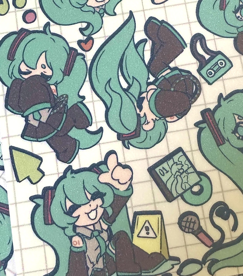 May include: A sheet of stickers featuring a cartoon character with long, teal hair and brown clothing. The stickers include various poses of the character, along with other small illustrations like a cursor, a cassette tape, and a microphone.