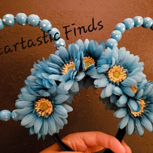 Disney inspired ears. Colorful daisy flower crown ears.  The ears are made  colorful beads. Perfect for a girls trip.