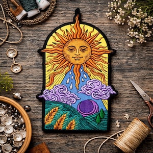 May include: Embroidered patch featuring a smiling sun with orange rays, set against a yellow and black arched background. Below the sun are blue raindrops, purple clouds, and green hills. The patch has a black border.