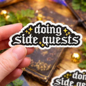 May include: A set of three ceramic mugs with a speckled, matte finish. The mugs are in shades of cream, light gray, and dark gray. Each mug has a simple, minimalist design, perfect for coffee or tea.