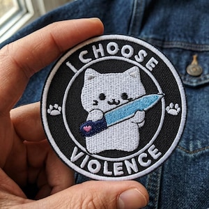 May include: A set of three ceramic mugs with a speckled, matte finish. The mugs are in shades of cream, light gray, and dark gray. Each mug has a simple, minimalist design, perfect for coffee or tea.