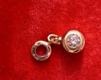 The EYE of Apollo and Hecate 21K Gold White and Blue Diamonds Silver