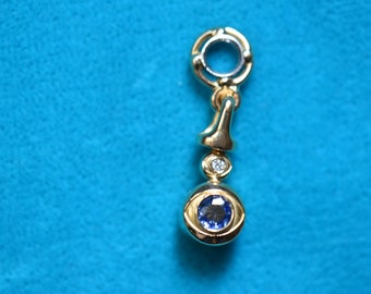 Four Eyes Solar-Lunar Turn-around Medallion Gold 21K Blue and White Diamonds