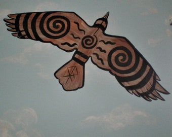 May include: A stylized brown and black bird with spiral designs on its wings, flying against a light blue sky with white clouds.