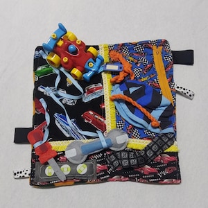 May include: A set of three ceramic mugs with a speckled, matte finish. The mugs are in shades of cream, light brown, and dark brown. Each mug has a simple, minimalist design, perfect for coffee or tea.