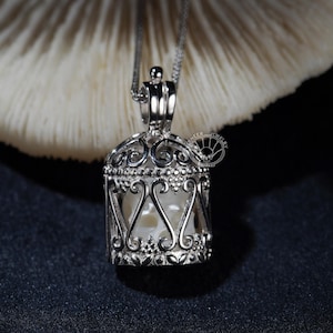 Handcarved Pearl Skull Necklace: Sterling Silver Cage Locket