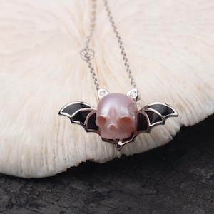 Handcarved Pearl Skull Necklace: Sterling Silver Bat Wing Pendant
