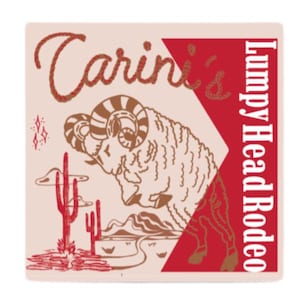 May include: Square sticker with a cream background featuring a ram illustration and the text "Carini's Lumpy Head Rodeo" in brown and red. The design includes a desert landscape with cacti.