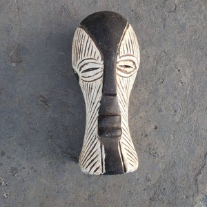 Songye home decor. Wooden sculpture. African mask.