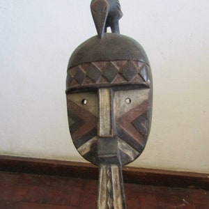 Ivory Coast mask. Guro tribe wooden mask. Tribal wall art for home decoration.