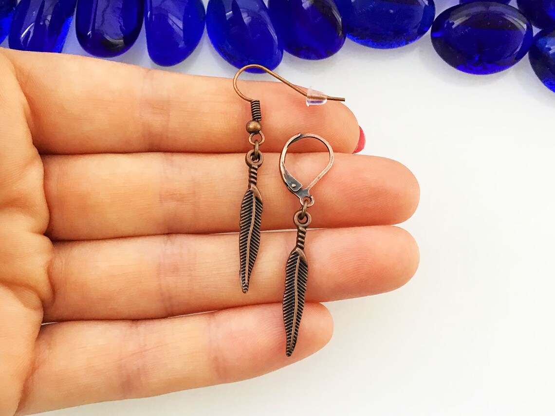 One copper feather earring Feather earrings Men dangle Etsy