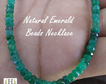 May include: A necklace composed of small, faceted, vibrant green emerald beads arranged in a continuous strand. The text Natural Emerald Beads Necklace is visible in the center, and a logo with the letter H and text Hayaat Gems is at the bottom.
