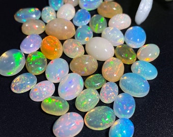 Stunning Opal Gemstones for Unique and Colorful Jewelry Designs Multi Flash Natural Ethiopian Opal Oval Shape Gemstones for Jewelry Making