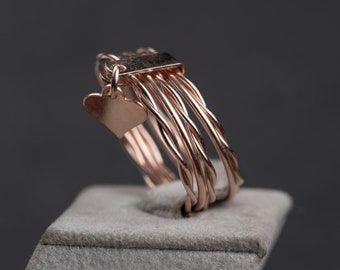 Vintage ring made of five individual rings with a small heart, completely reworked, 835 silver, replated with 18k rose gold, size 57, unique