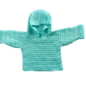 May include: A turquoise crocheted hooded sweater for a baby.