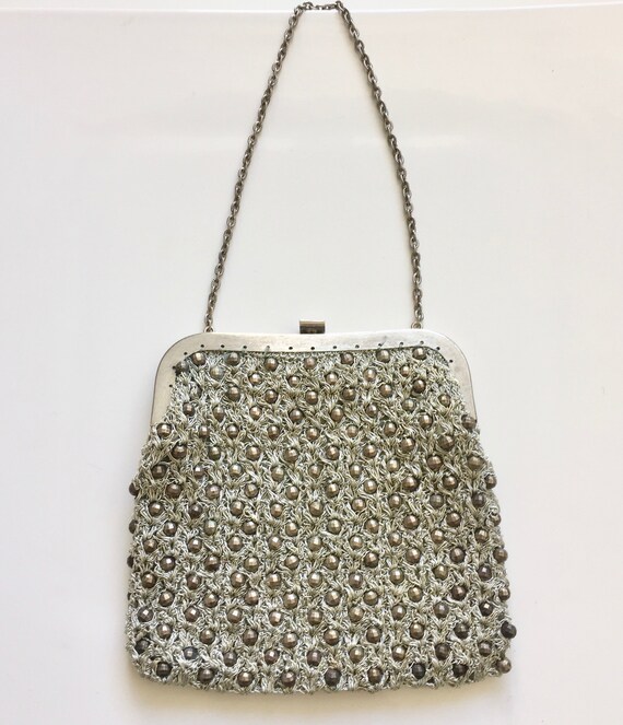 silver beaded clutch bag