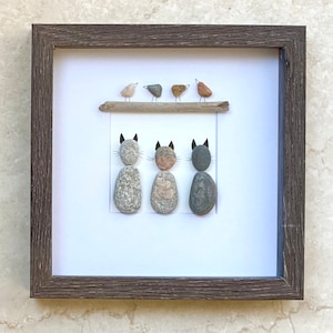Pebble cats and birds