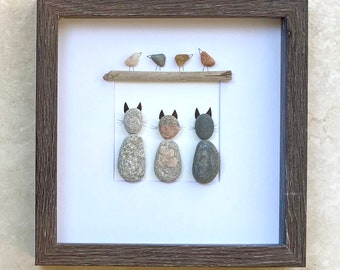 Pebble cats and birds