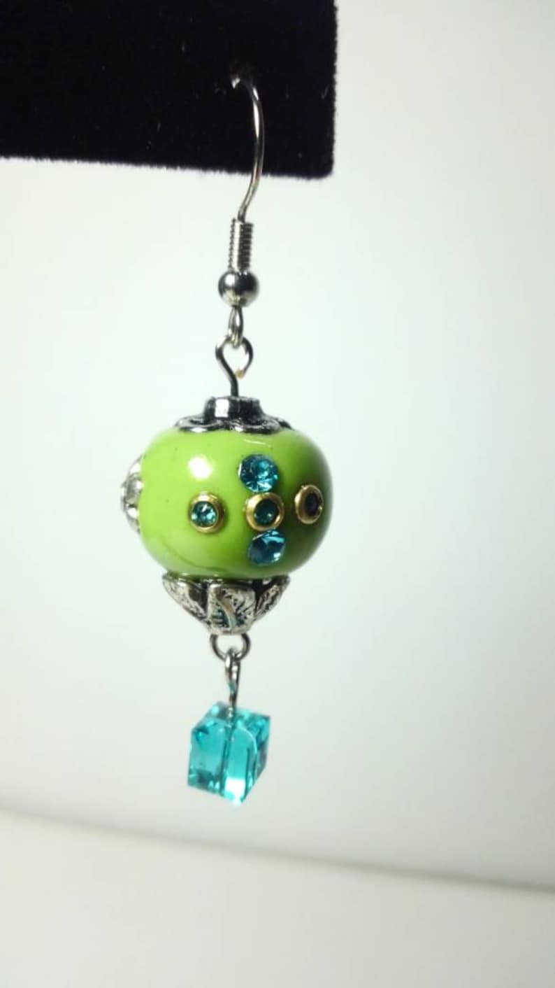 10 Electric Green Hot Air Balloon Earrings with a crystal cube as the basket.