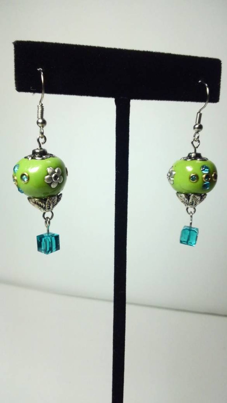 10 Electric Green Hot Air Balloon Earrings with a crystal cube as the basket.