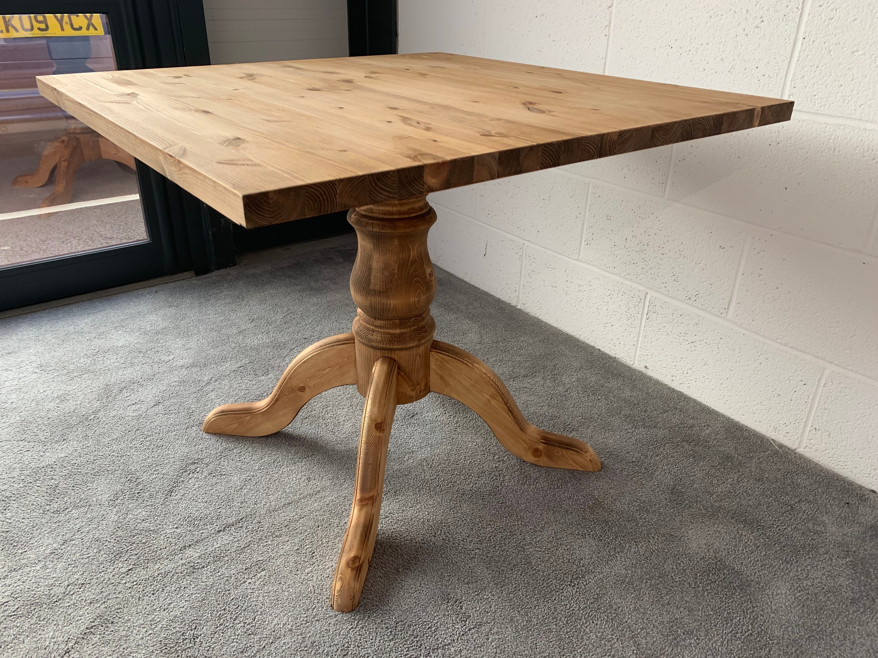 Square pedestal dining table on sale for 4