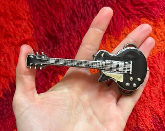 Vintage 1980s electric guitar Belt buckle  Bergamot Brassworks black white 1981 Groovy Hippie Novelty Gift Brass musician music rock