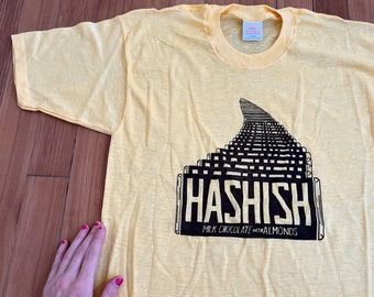 Vintage 1970s Rare Counterculture Hashish Chocolate with Almonds Logo Graphic T Shirt // Hippie 70s 60s 1960s Drugs Psychedelic Tee Yellow