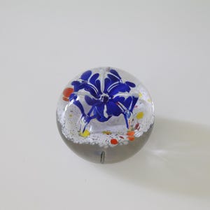 Vintage Art Glass Paperweight – Handblown Clear Orb with Blue Flower and Colorful Confetti Accents