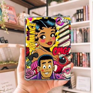 May include: A colorful phone case with a comic book style design featuring a woman with black hair and a man with brown hair. The case has the words "Black Romance", "Yes!" and "OMG!" on it.