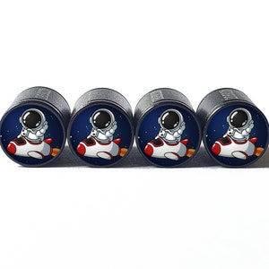 Tapas de válvulas de neumáticos de astronauta y nave espacial de dibujos animados - Aluminio negro - Juego de cuatro