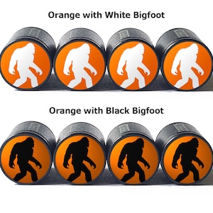 Orange Bigfoot Sasquatch Walking Tire Valve Caps