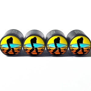 Surfing Bigfoot Sasquatch (Style 1) Tire Valve Caps - Black Aluminum - Set of Four