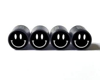 Cappucci per valvole pneumatici con faccina sorridente (neri) - Alluminio nero - Set di quattro
