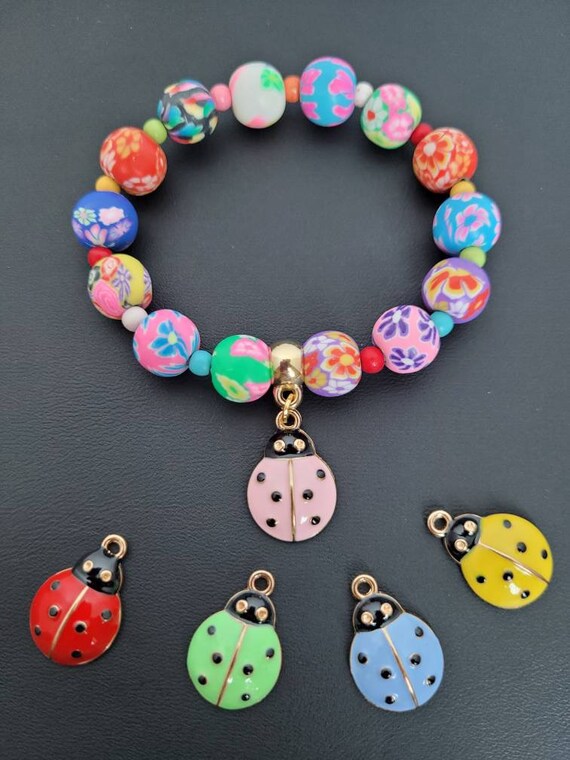 Polymer Clay Bracelet With Lady Bug Charm, Floral Printed Polymer