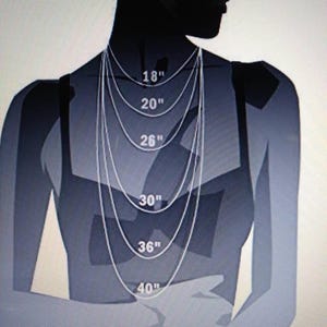May include: A grayscale illustration of a person's upper body, showcasing necklace lengths. The image displays necklaces of 18", 20", 26", 30", 36", and 40" lengths, providing a visual guide for necklace sizing. The person is wearing a tank top.